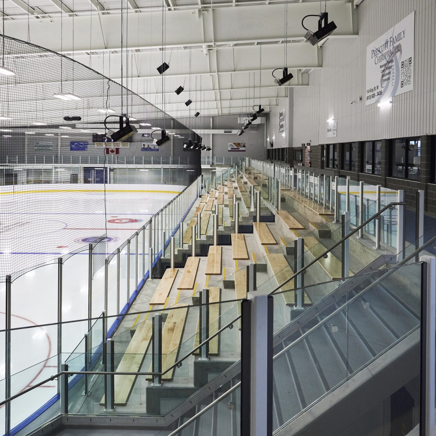 Interior of arena, showing ice rink and seating